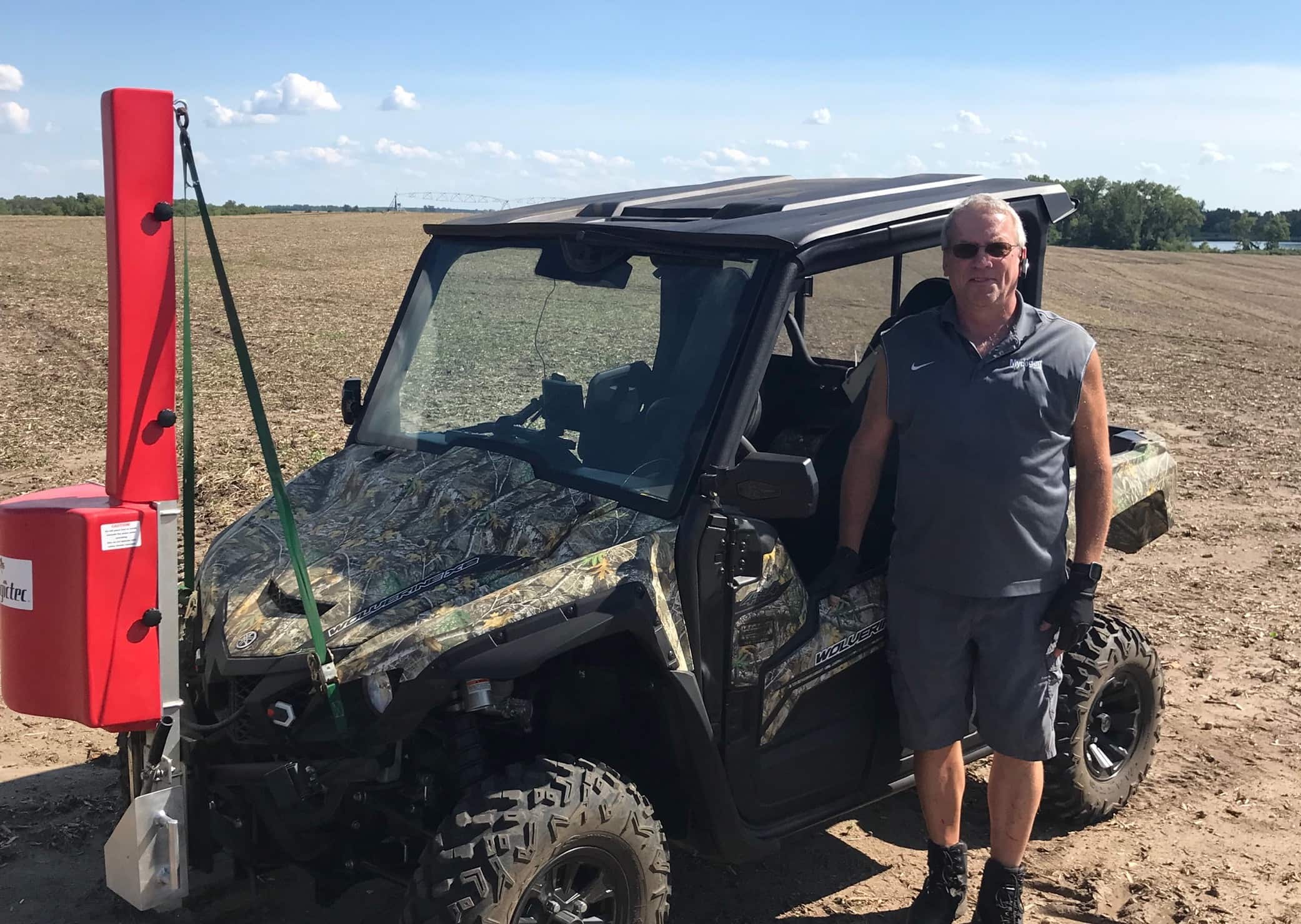 Belgrade Co-op Agronomist Al Braegelman at work collecting soil samples in a harvested field.