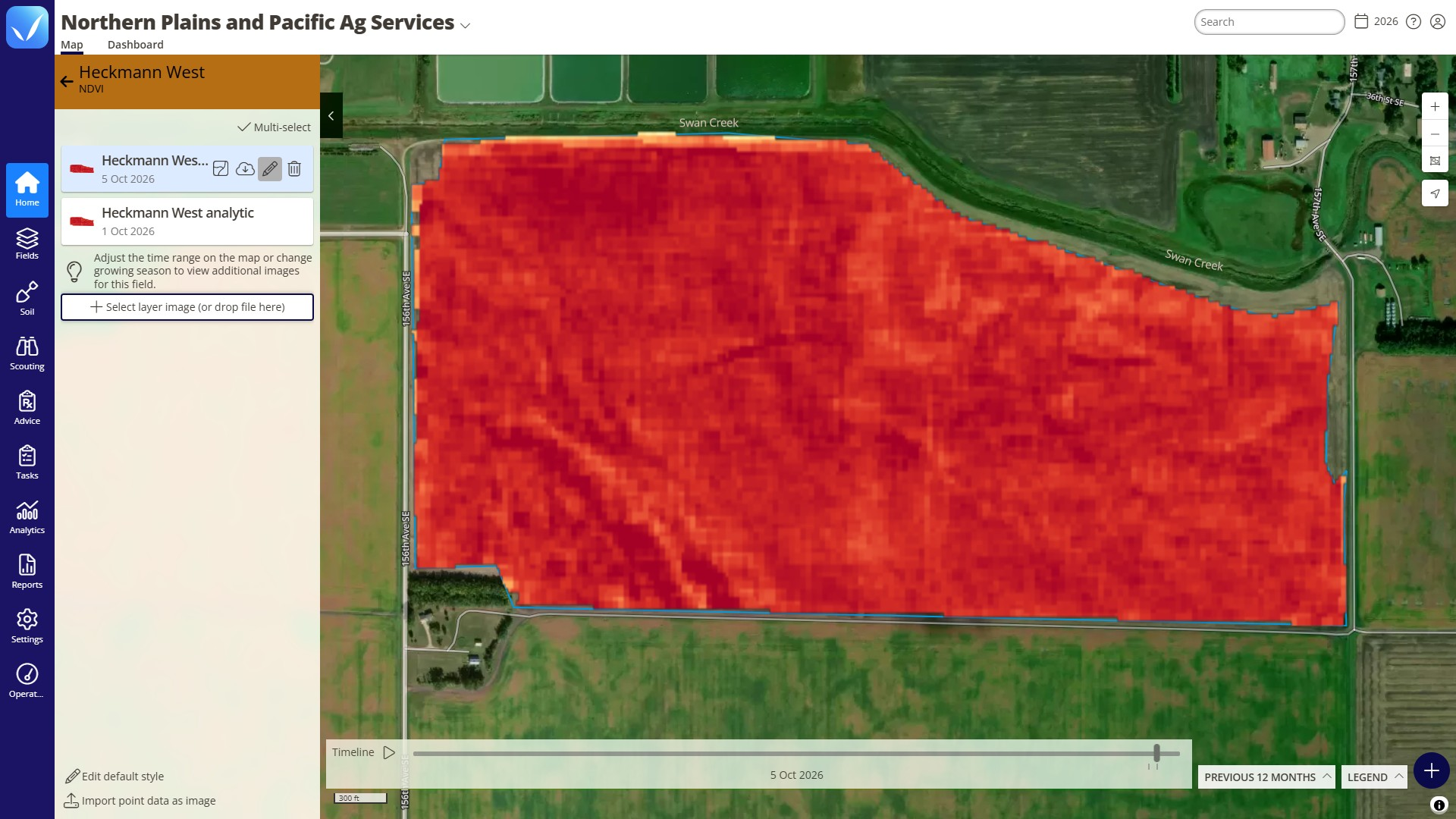 NDVI layer view on the Map tab of the FarmQA web app, showing the 5 Oct 2026 image for Heckmann West. The panel lists two imagery layers, 5 Oct 2026 and 1 Oct 2026. The red-to-orange heat map shows the field’s variation in crop vigor, and the timeline sits below it.